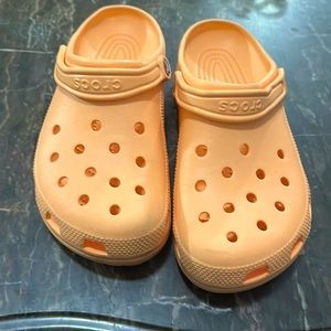 Crocs almost new condition ,man size 10 or woman size 12